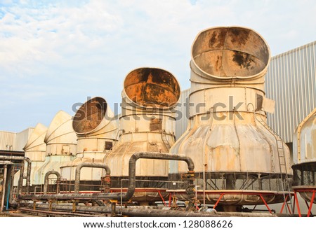 The cooling tower in factory on blue sky background