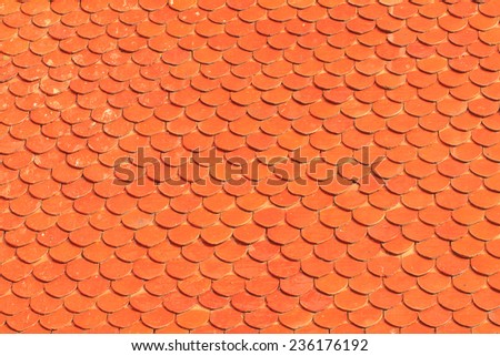 Orange roof tiles of a old built house