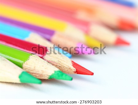 Colored pencils in the White background,black,shallow depth of field