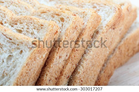 Whole wheat bread in a white background,Close up macro of a bread