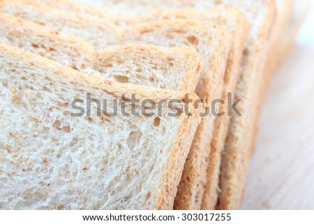 Whole wheat bread in a white background,Close up macro of a bread
