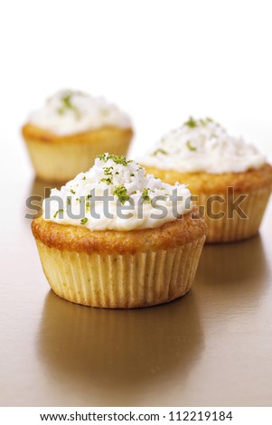 Cupcakes with coconut and lime frosting