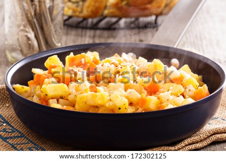 Apple and root vegetable hash with potato, carrots and celery root
