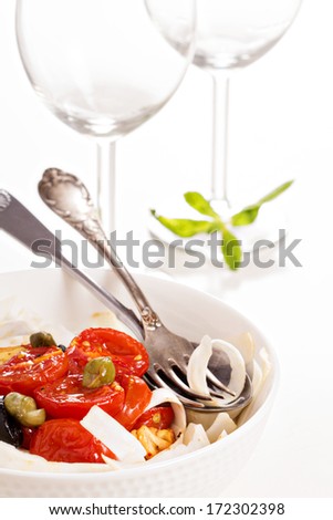 Celery root pasta with tomatoes, olives and capers