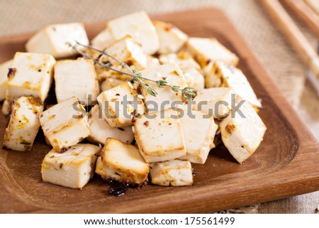 Baked marinated tofu with herbs and spices