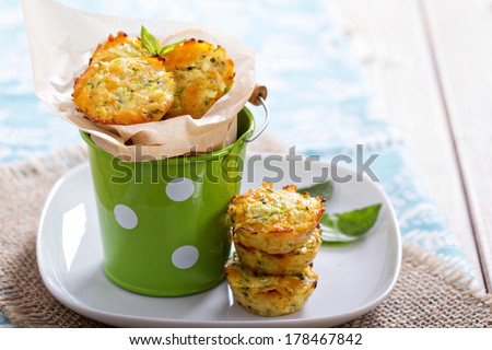 Baked zucchini appetizers with cheese and herbs