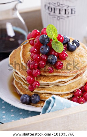 Vegan pancakes with mixed berries for breakfast