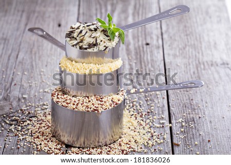 Variety of grains in stacked measuring cups