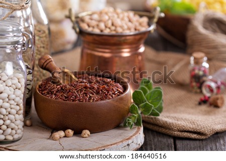 Variety of grains and beans on a wooden table