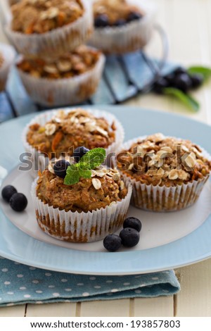 Vegan banana carrot muffins with oats and berries