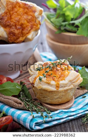 Mini quiche with puff pastry and cheese