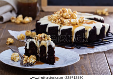 Chocolate ginger pear cake with cream cheese glaze and caramel topping