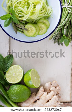Green vegetables, lime and ginger for asian cooking
