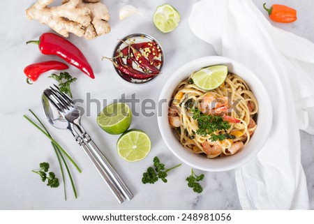 Coconut milk and shrimp asian style pasta with lime juice