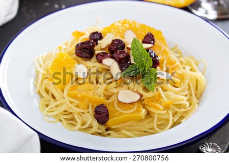Dessert pasta with orange and dried cherry