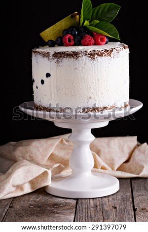 Gluten free layered cake with mascarpone and berries contrast light