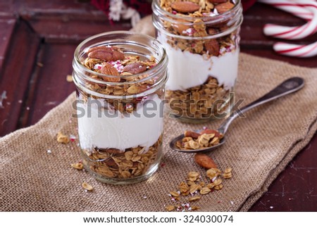 Gingerbread granola parfait with yogurt and crushed candy cane