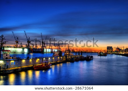 high dynamic range or hdr image of the port in Hamburg, Germany. industrial area at dusk or dawn. (tourist area).