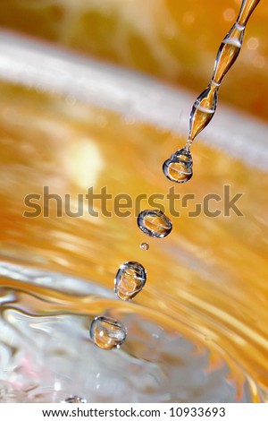 Here are the pure drops of water, the rest is the play with background and light. The background is a fresh orange.