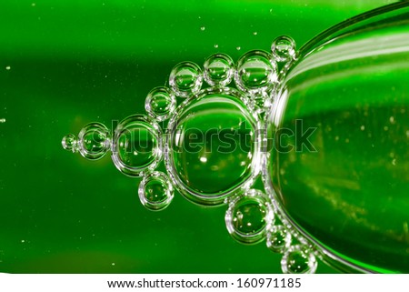 Green bubbles in clear water.