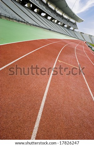 Running tracks at an empty stadium with a tilted horizon