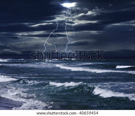 Lightning over sea with dark clouds