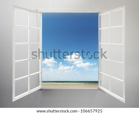 Modern residential window open with ocean view and clouds