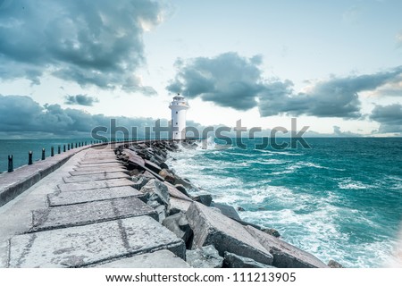 Lighthouse and the waves