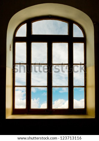 Old French style window and sky behind