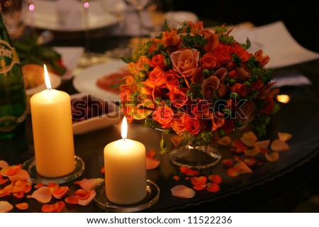 stock photo Romantic dinner table settings with flowers and candles
