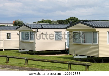 Caravan mobile homes in modern trailer park.