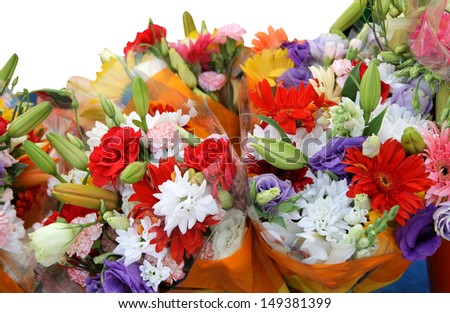 Bouquets of colorful flowers isolated on a white background.