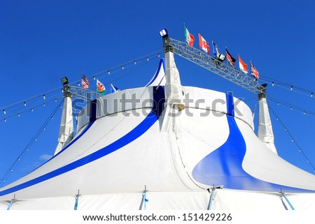 Circus big top tent in blue and white.