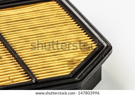 Dirty Air Filter Cartridge on White Background, Closeup