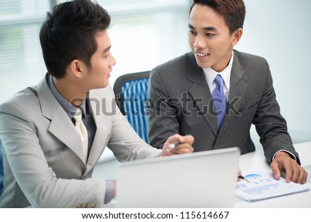 Partners with positive attitude agreeing upon certain business issues