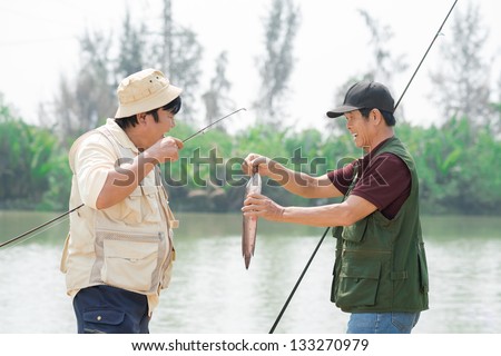 Fishermen after catching their big fish outside