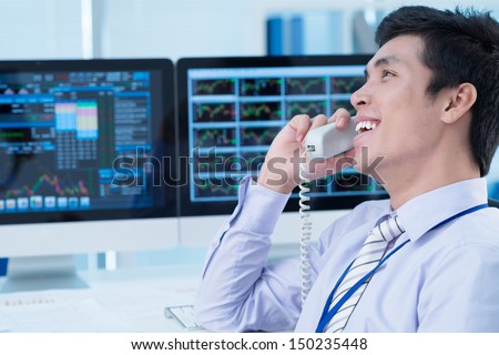 Businessman calling from his wokplace