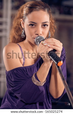 Close-up of a female jazz singer on stage