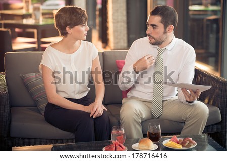 Image of business colleagues where a man expressing his point of view while business discussion