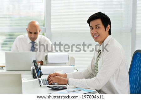 Portrait of Asian manager working in the office