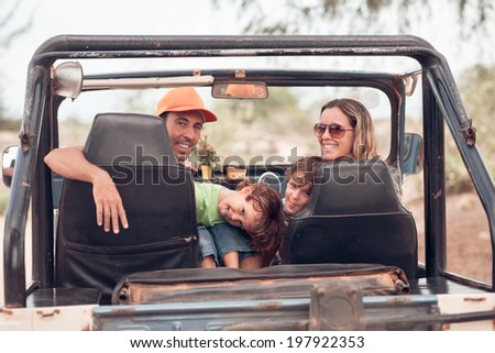 Family enjoying their ride in the off-road vehicle