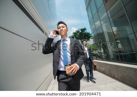Young businessmen going to the work in the morning