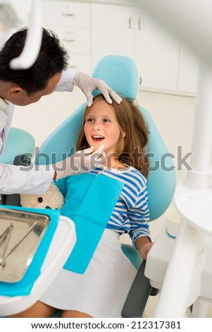 Schoolgirl at a dentist