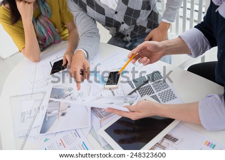 Cropped image of design team planning a new project