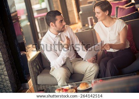 Business people having meeting in the cafe
