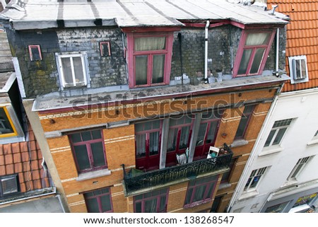 Brussels. View of city roofs from a house window