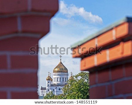 Moscow. View of the Cathedral of Christ the Saviour through a teeth of the Kremlin wall