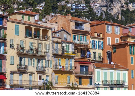 France , Cote d\'Azur , Villefranche , October 16, 2013 . Architectural detail of old houses on the waterfront. View from the sea .