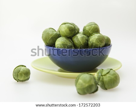 Brussels sprouts in a blue bowl