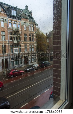 AMSTERDAM, HOLLAND- APRIL 16, 2012:  View from the restaurant window in the rain